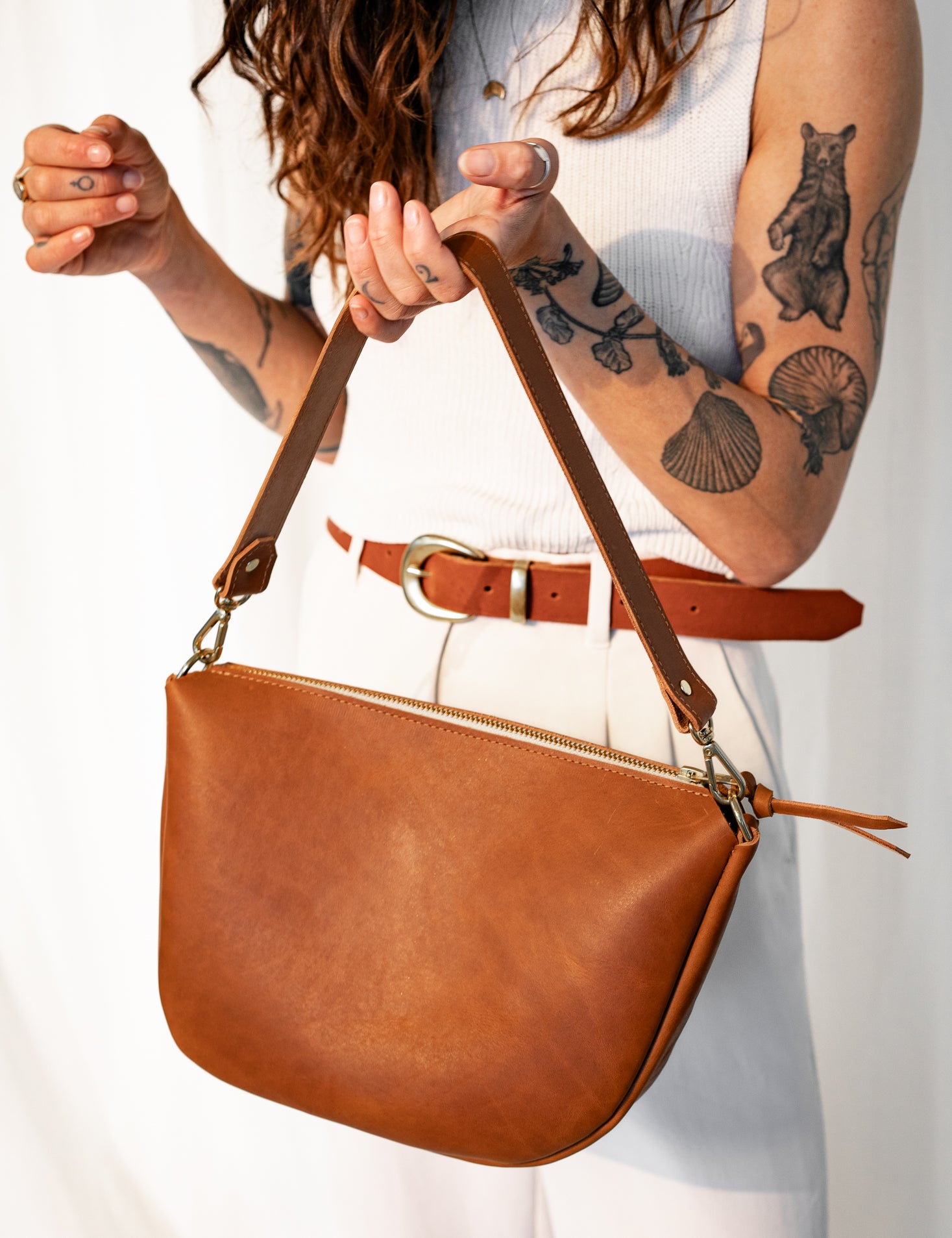 4 REASON TO CARRY A LEATHER BAG